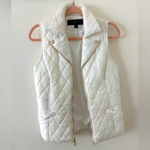 White puffer vest